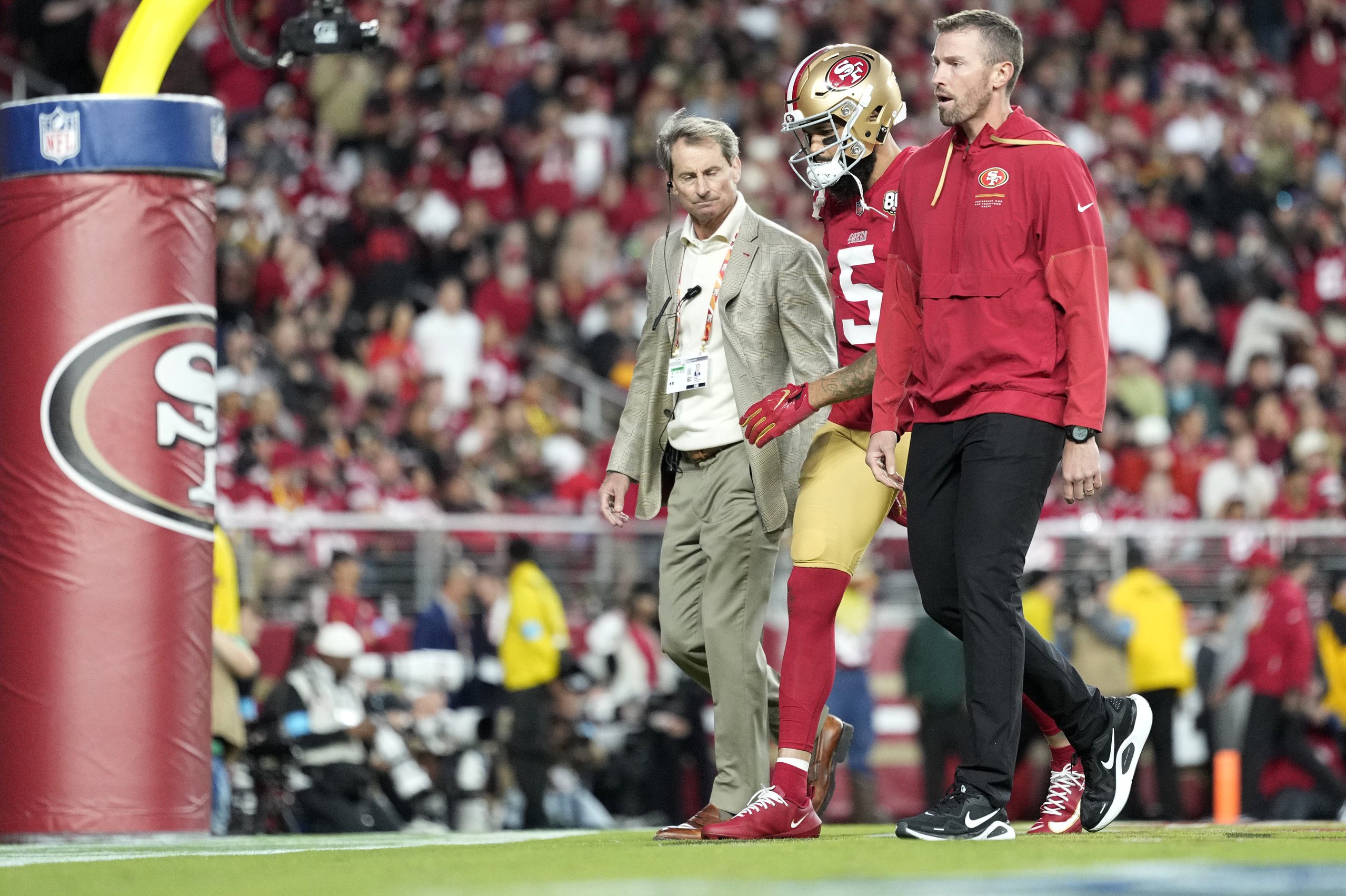 Oct 19, 2026; Santa Clara, California, USA;  San Francisco 49ers wide receiver Mike Evans (5) leaves the field with an injury during the second quarter against the Washington Commanders at Levi's Stadium.  Mandatory Credit: Kyle Terada-Imagn Images