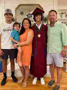 Brandon Guffey (right), Gavin Guffey (second from right), Guffey's wife (middle), and their two youngest sons (left)