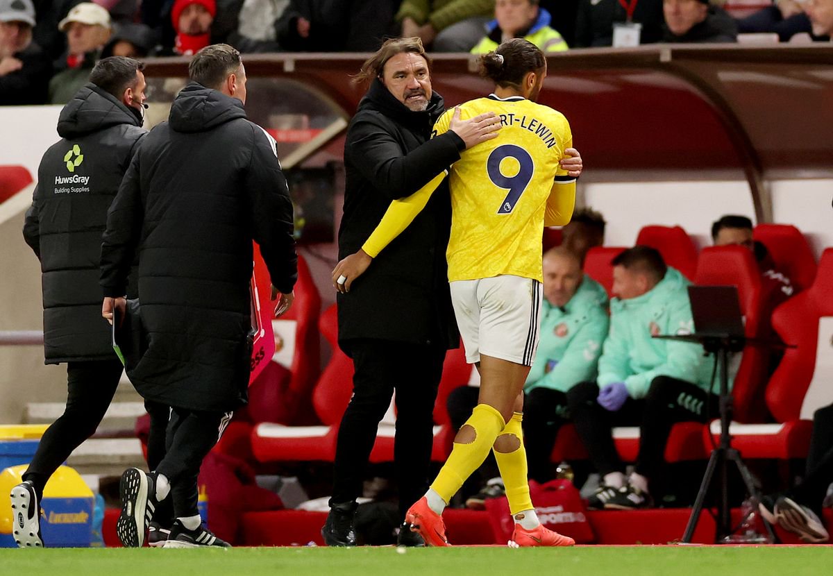 Daniel Farke, Manager of Leeds United, embraces Dominic Calvert-Lewin 