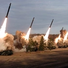Kim Jong Un oversees 'super-large' rocket launcher firing drills