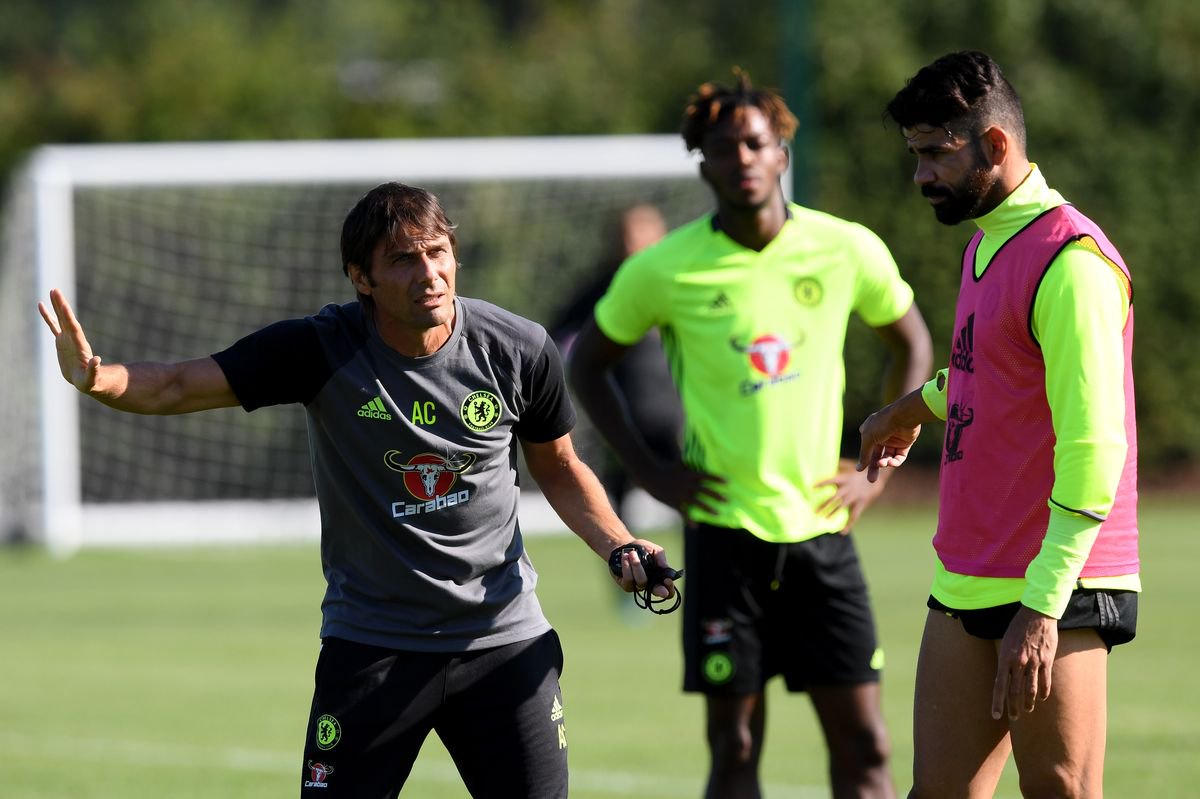 Antonio Conte and Diego Costa of Chelsea during a training session at Chelsea Training Ground