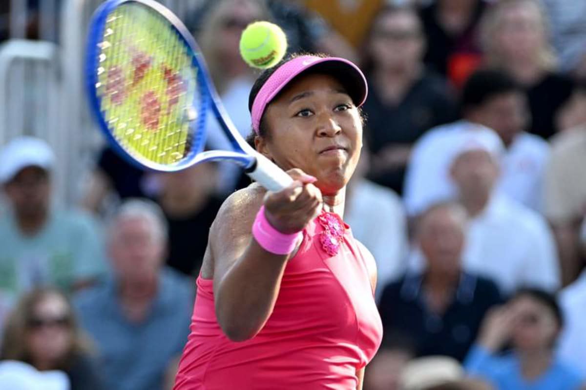 Aug 7, 2026; Toronto, Ontario, Canada; Naomi Osaka (JPN) plays a shot against Elise Mertens (BEL) during third round play at Sobeys Stadium. © Dan Hamilton-Imagn Images