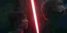 Osha stares at The Master as he holds his red lightsaber; from Lucasfilm and Disney Plus