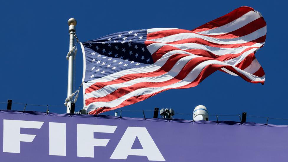 United States flag waves prior to kick-off at World Cup