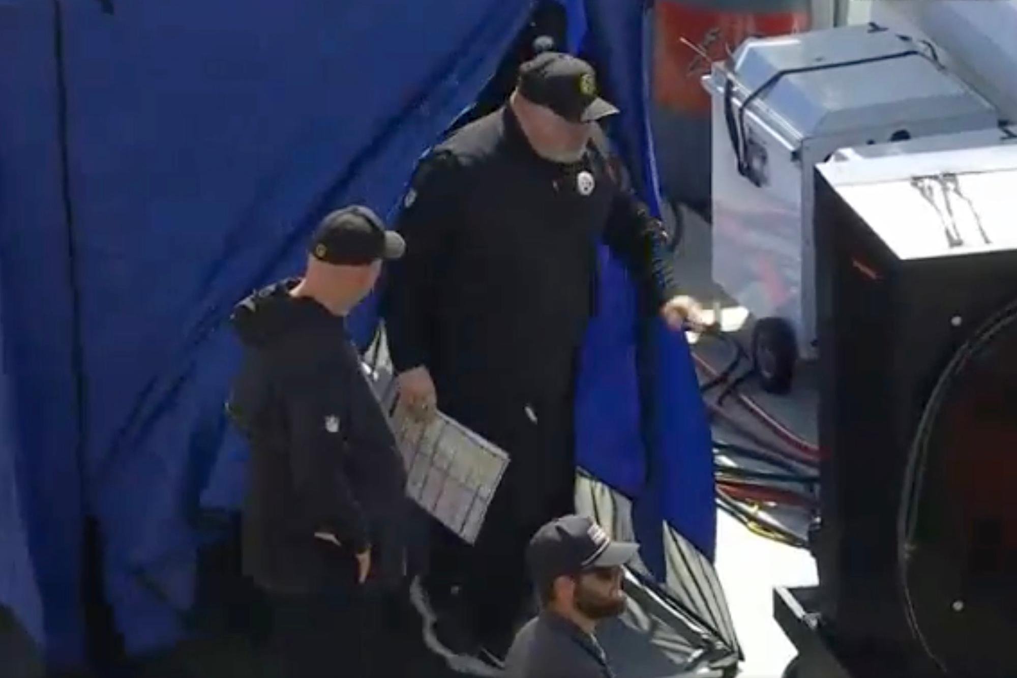 Steelers head coach Mike McCarthy exits the blue medical tent on Oct. 18, 2026.