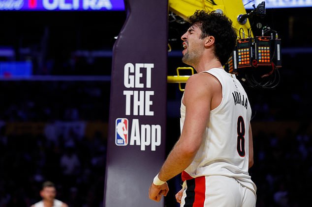 Portland Trail Blazers forward Deni Avdija (8) reacts after scoring during the first half of an NBA basketball game against the Los Angeles Lakers, Tuesday, Oct. 27, 2026, in Los Angeles. (AP Photo/Caroline Brehman)