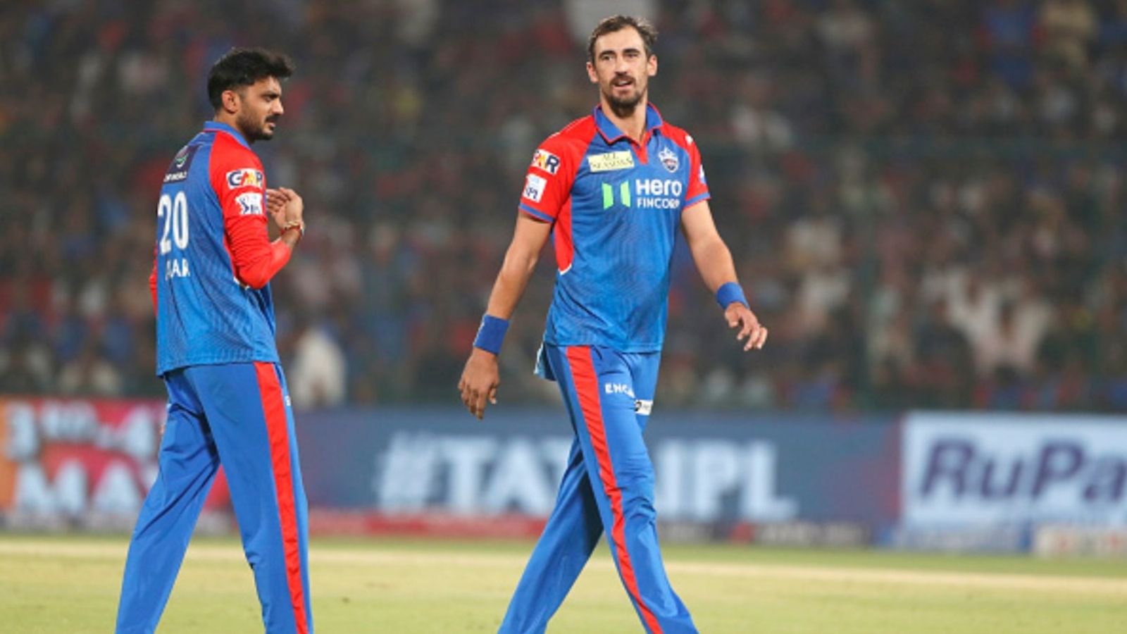 Delhi Capitals captain Axar Patel and Mitchell Starc during the 2025 IPL match against Royal Challengers Bengaluru on April 27, 2025, in Delhi, India. 
