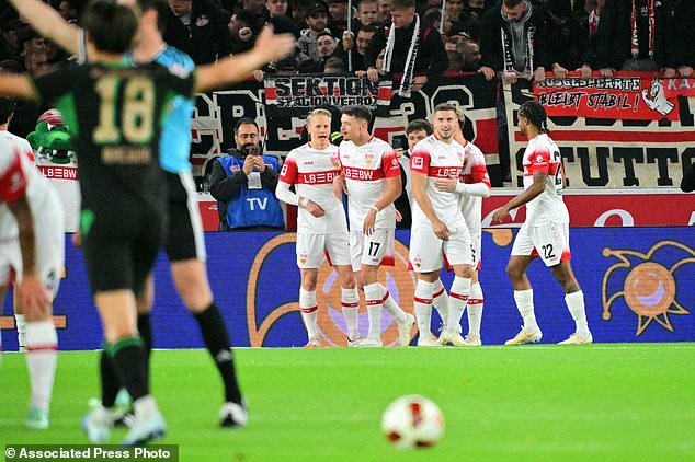 Stuttgart players celebrate a goal during the Bundesliga soccer match between VfB Stuttgart and Borussia Mönchengladbach in Stuttgart, Germany, Friday Oct. 23, 2026. (Jan-Philipp Strobel/dpa via AP)