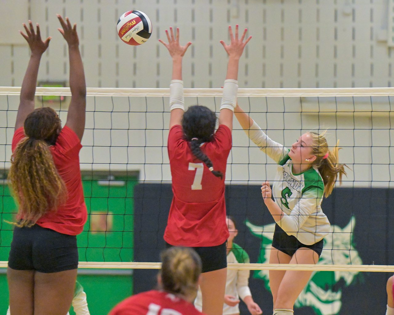 Arundel Wildcats Addison Williams #5 hits the ball over in the first set. The Arundel Wildcats defeated the visiting Crofton Cardinals in three sets in their high school volleyball match Tuesday evening. (Paul W. Gillespie/Staff)