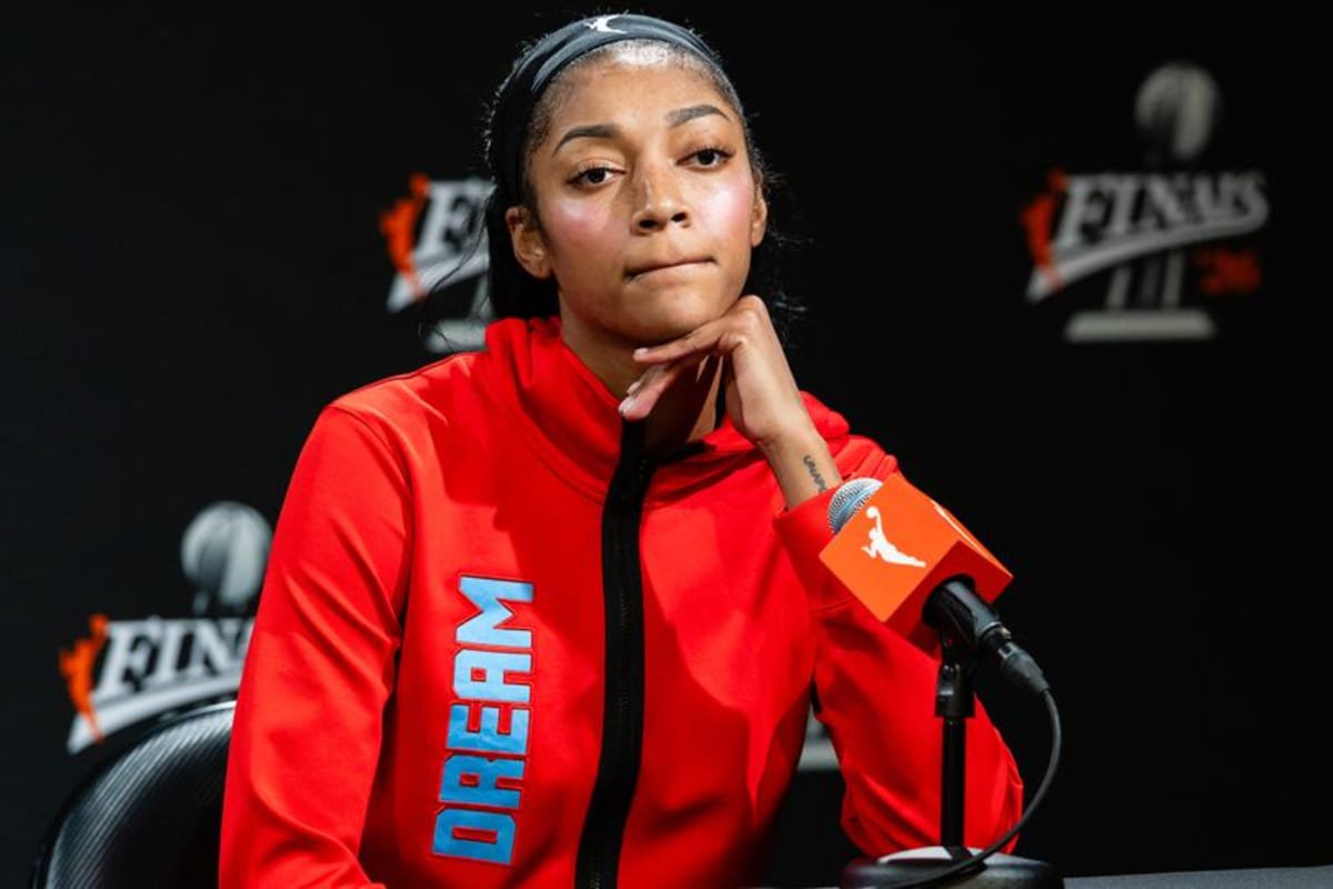 Angel Reese speaks to the media