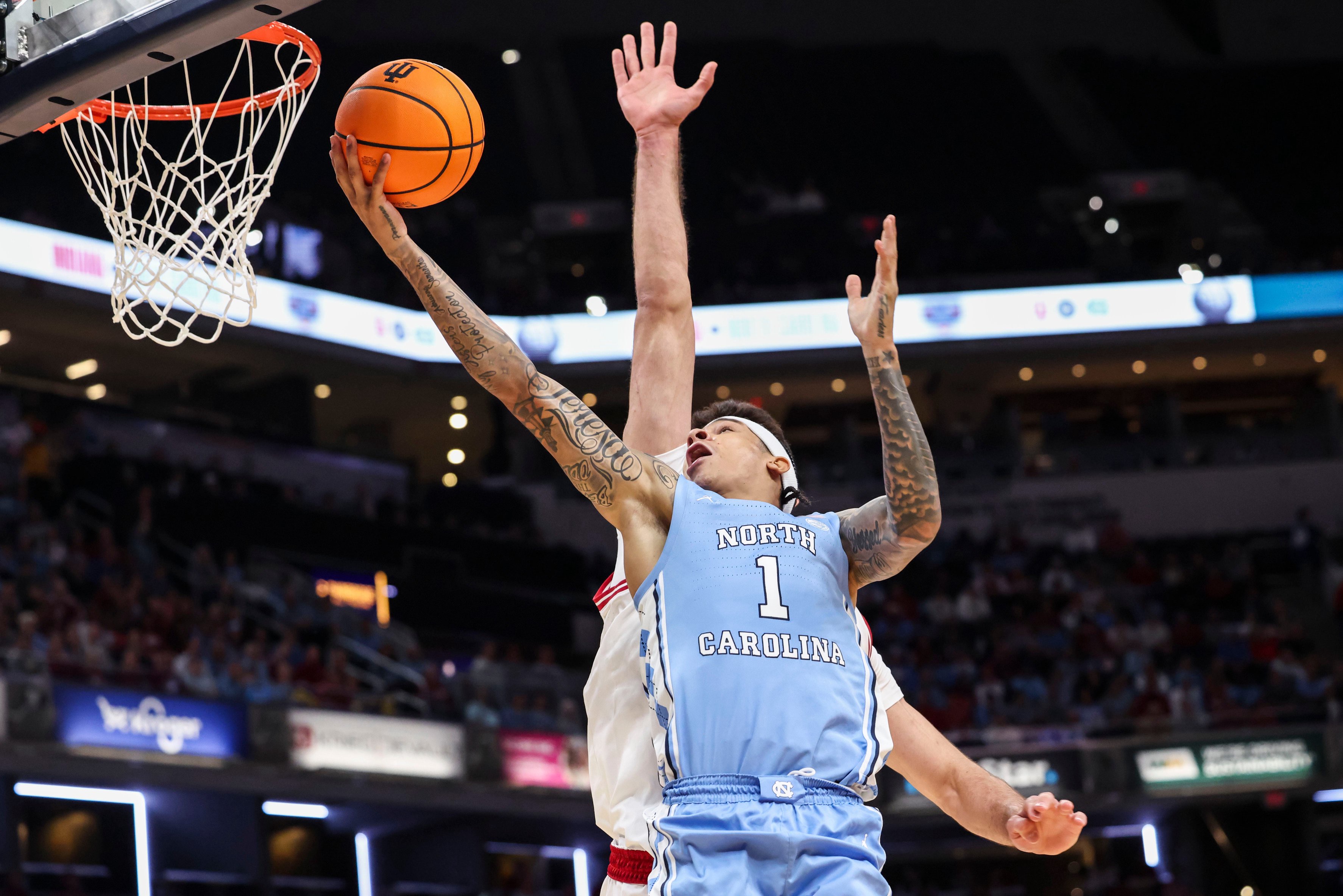 North Carolina Tar Heels guard Terrence Brown (1) goes up for a basket Sunday, Oct. 18, 2026, during the first half of an exhibition game at Gainbridge Fieldhouse in Indianapolis.