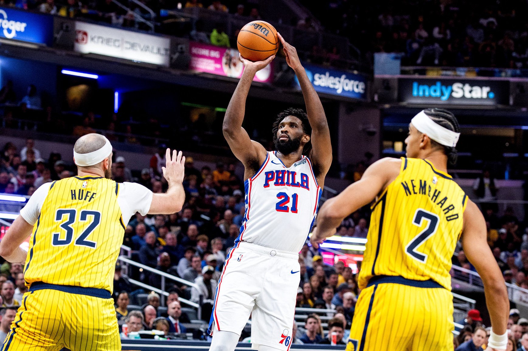Oct 28, 2026; Indianapolis, Indiana, USA;  Philadelphia 76ers center Joel Embiid (21) shoots the ball while Indiana Pacers center Jay Huff (32) defends in the second half at Gainbridge Fieldhouse.  Mandatory Credit: Trevor Ruszkowski-Imagn Images