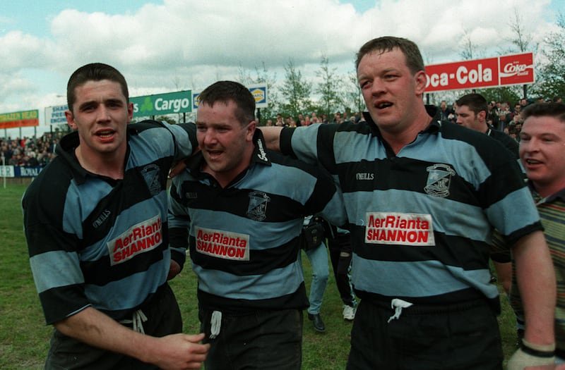 Alan Quinlan, Anthony Foley and Mick Galwey after a win with Shannon in April 1998. Photograph: Billy Stickland/Inpho