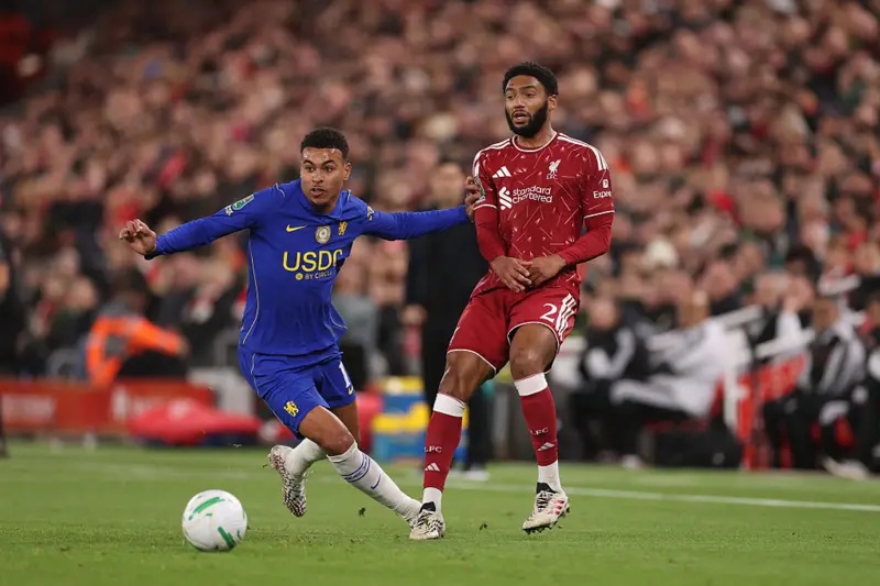 Morgan Rogers of Chelsea is challenged by Joe Gomez