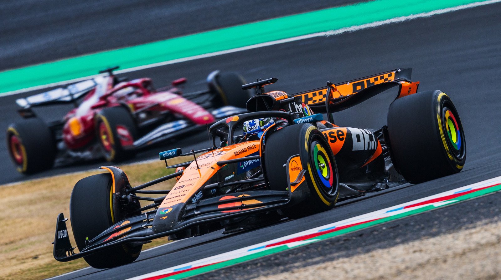 McLaren F1 car being chased by a Ferrari F1 car