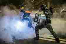Police fired tear gas during a protest in Hong Kong's district of Causeway Bay in Hong Kong on August 4, 2019