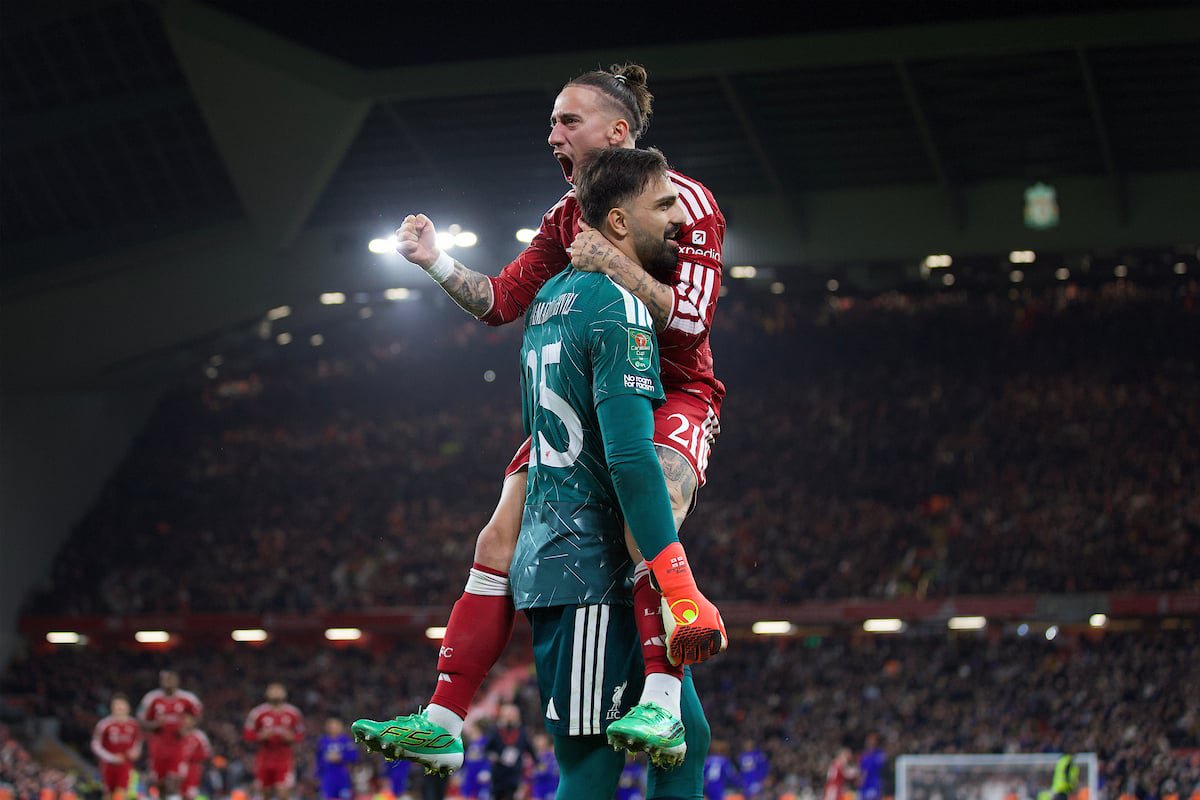 LIVERPOOL, ENGLAND - Wednesday, October 28, 2026: Liverpool's goalkeeper Giorgi Mamardashvili and Kostas Tsimikas celebrate winning the penalty shoot-out after the Football League Cup 4th Round match between Liverpool FC and Chelsea FC at Anfield. Liverpool won 6-5 on penalties. (Photo by David Rawcliffe/Propaganda)