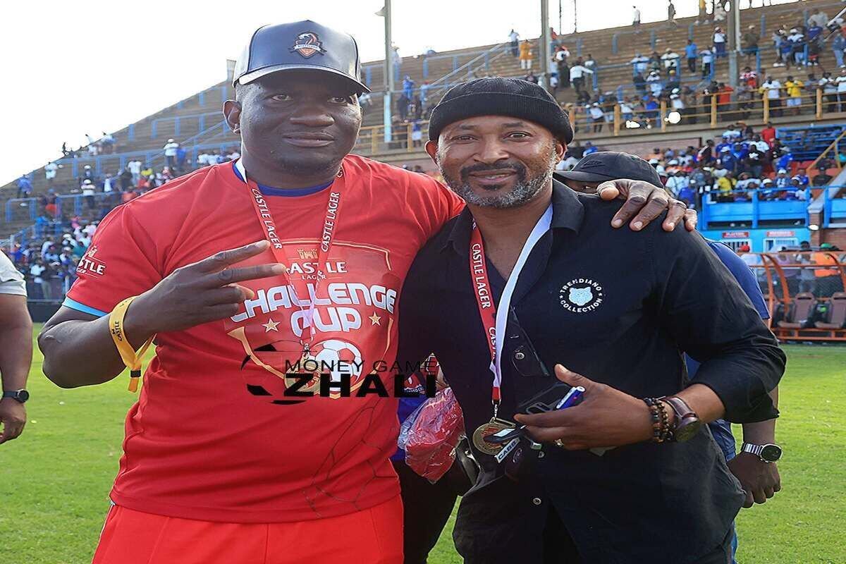 Scottland FC president Scott Sakupwanya (left) with team manager Peter Ndlovu.