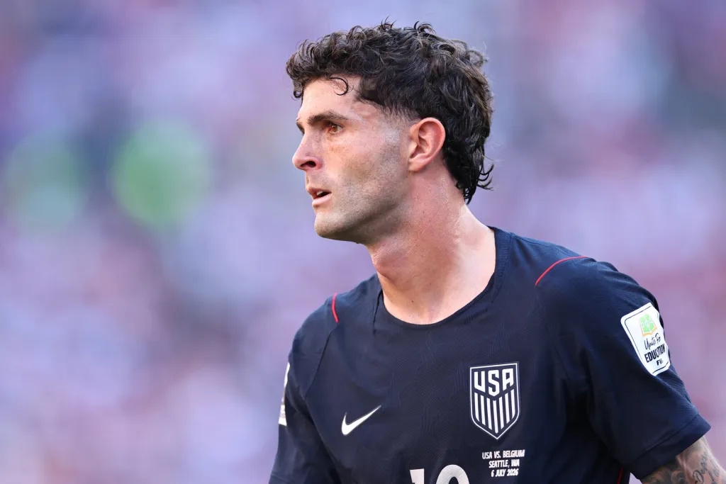 Christian Pulisic wearing the USMNT jersey during a match against Belgium.