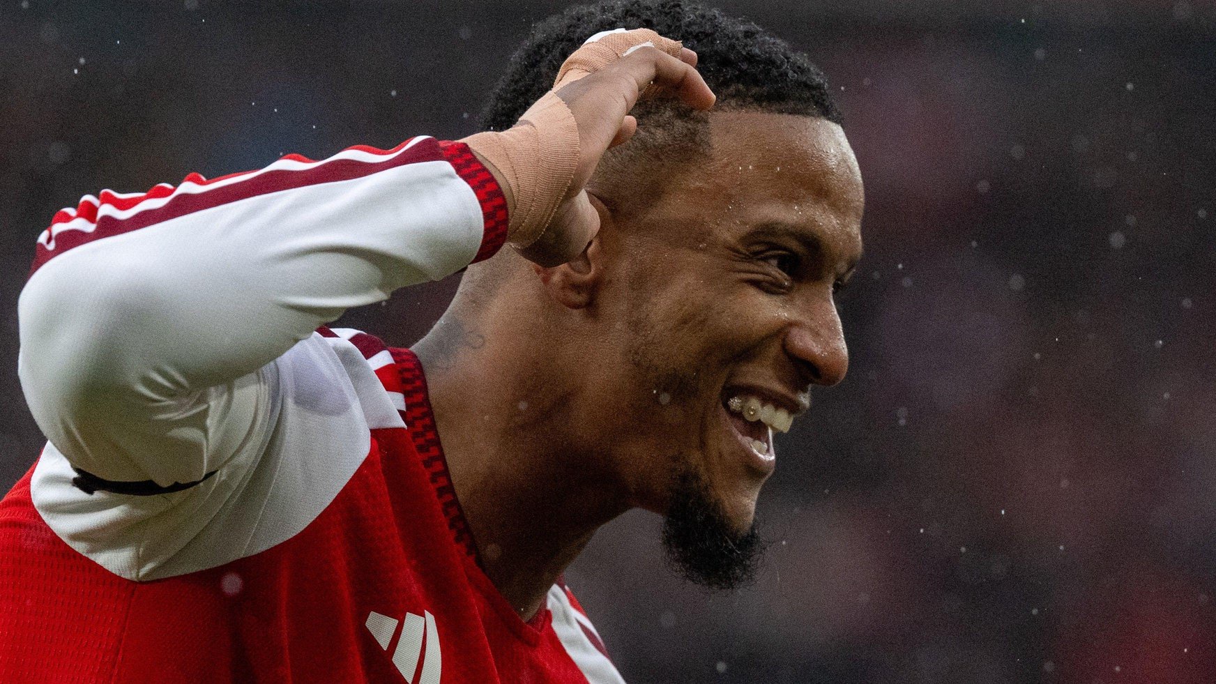 Ezri Konsa celebrates