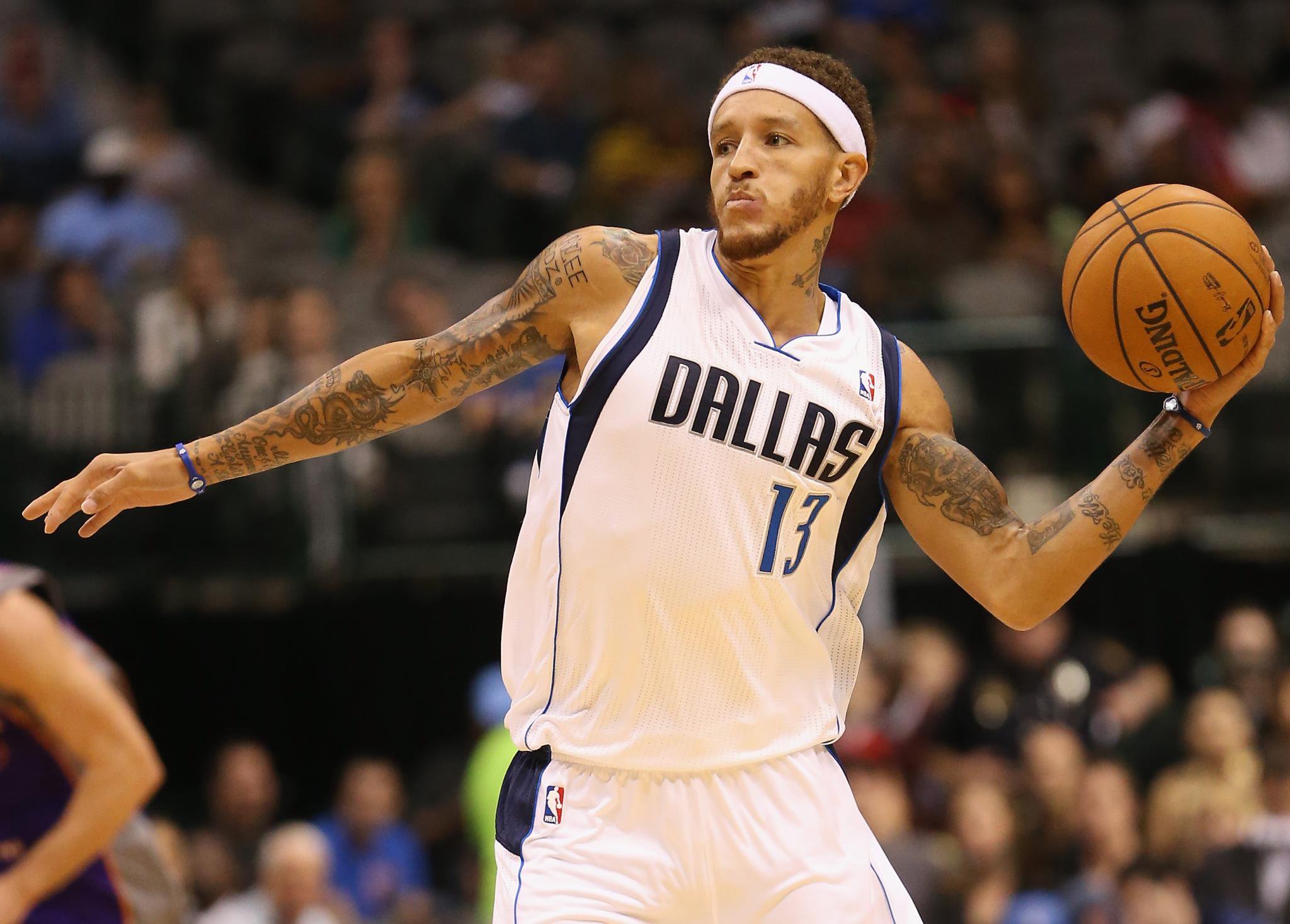 Delonte West of the Dallas Mavericks holds a basketball during a game against the Phoenix Suns.