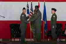 From left to right Col. Kenneth Voigt 552nd Air Control Wing commander, Col. Kendrick Carroll, former 552nd Training Group Commander and Col. James Ord 552nd, Training Group Commander, salute for the presentation of the colors during a change of command ceremony