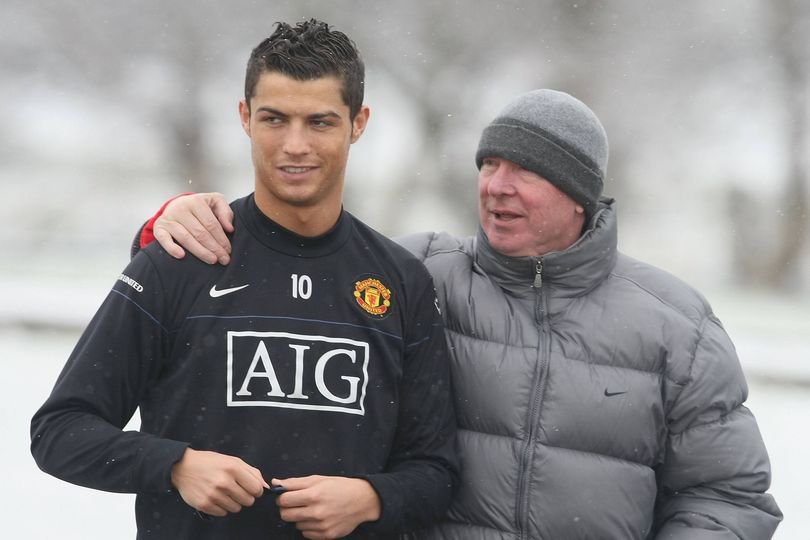 Cristiano Ronaldo and Sir Alex Ferguson of Manchester United in action during a first team training session at Carrington Training Ground in 2009.