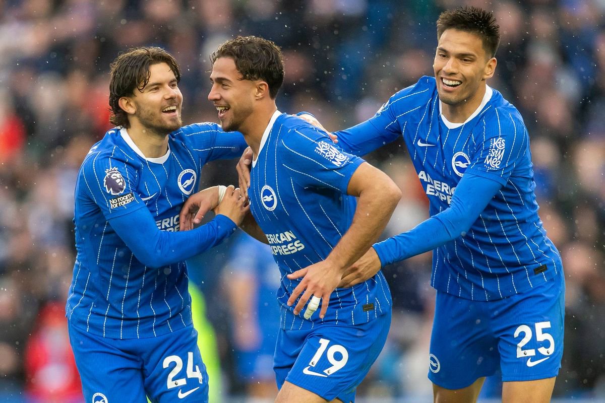 Charalampos Kostoulas celebrates with Brighton players