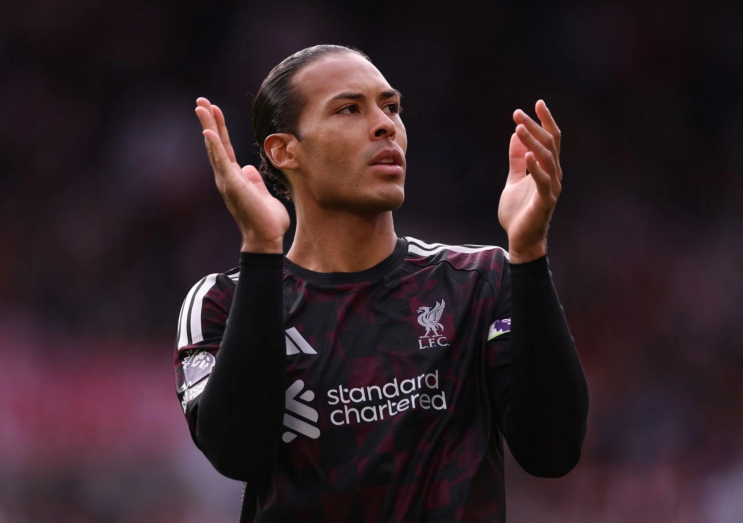 Virgil van Dijk clapping.