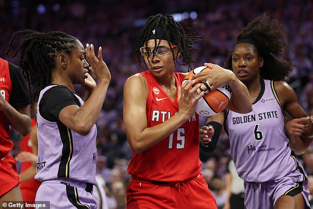 Atlanta Dream and Golden State Valkyries players left the court for the national anthem