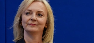 Liz Truss loses seat as ex-prime minister becomes biggest scalp in Tory bloodbath