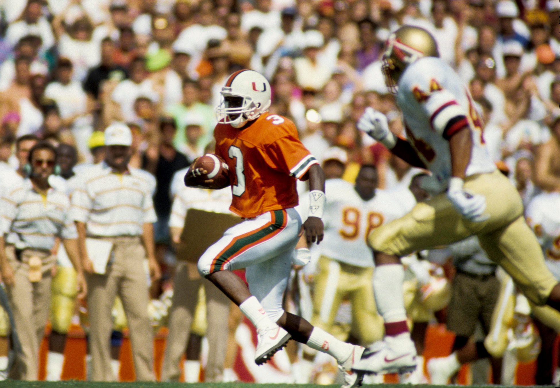 Oct 6, 1991; Miami, FL, USA; FILE PHOTO; Miami Hurricanes receiver Randall Hill (3) against the Florida State Seminoles at the Orange Bowl. Miami defeated FSU 31-22. Mandatory Credit: RVR Photos-USA TODAY Sports