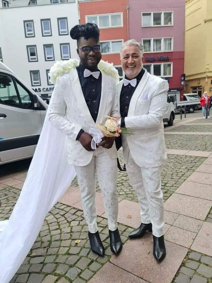 Massive reactions on social media as Ghanaian G@y man gets married to American husband (photos)