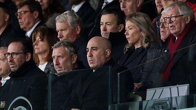 Manchester United executives, with Sir Alex Ferguson, watch the team in action at Leeds United from the stands