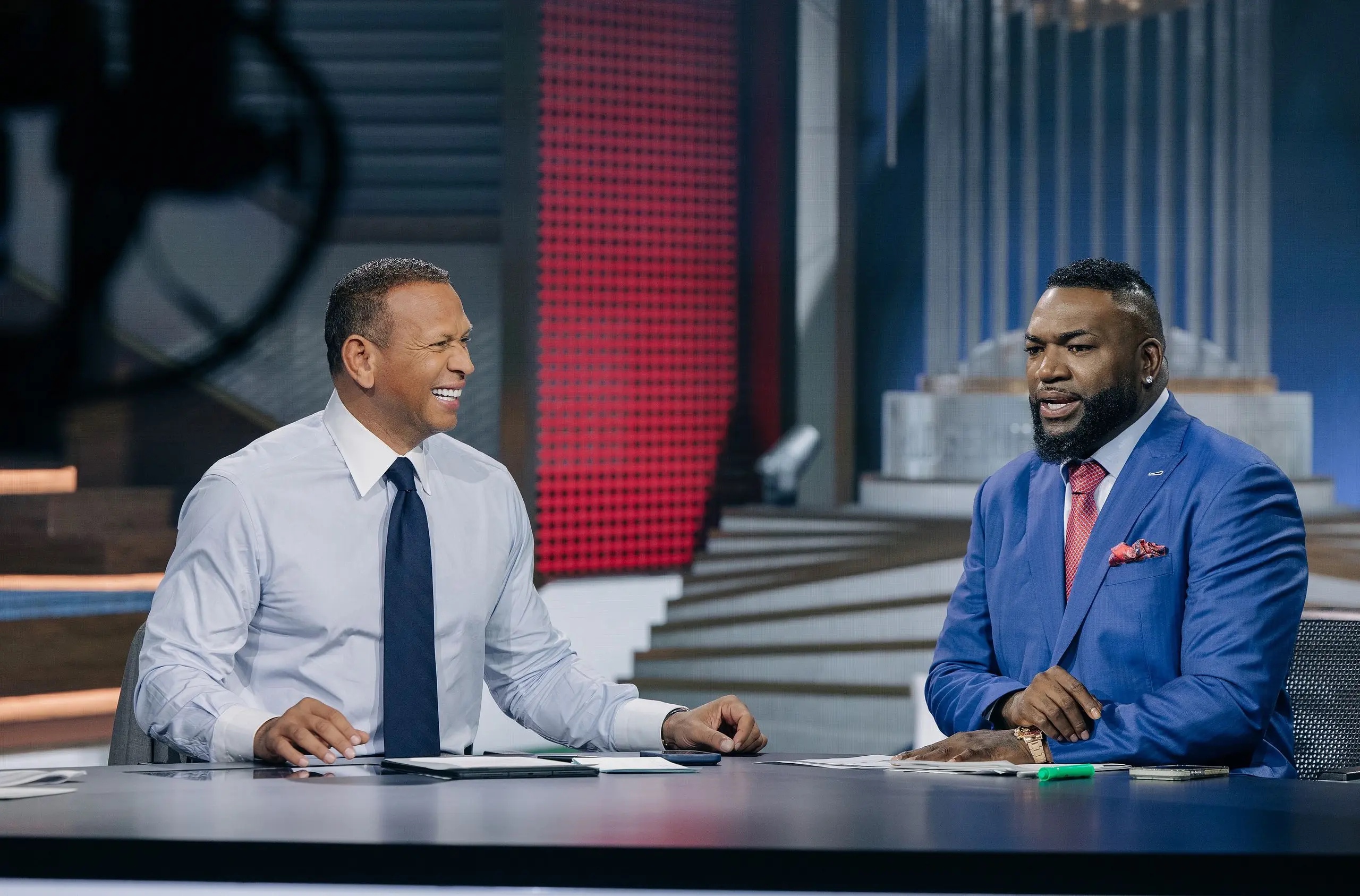 Alex Rodriguez (left) smiles while David Ortiz speaks during the MLB on Fox show.
