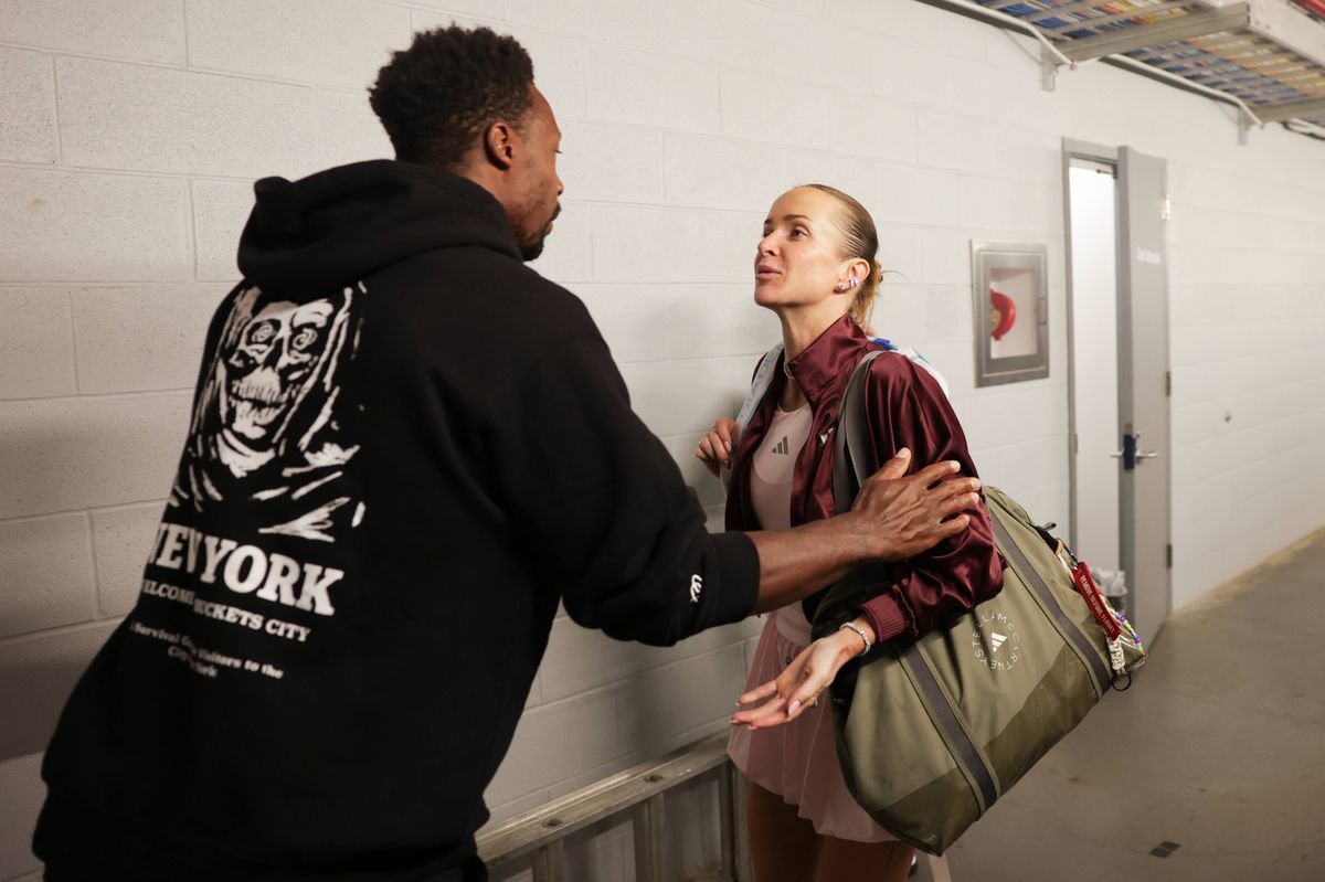 Elina Svitolina greets Gael Monfils after a Women's Singles match on Day One of the 2026 US Open at USTA Billie Jean King National Tennis Center