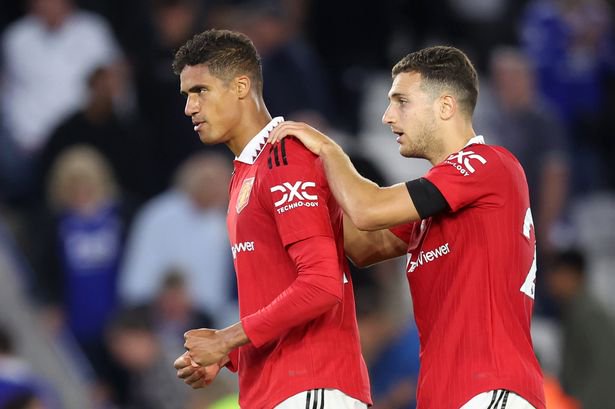 Varane and Dalot celebrate at full-time
