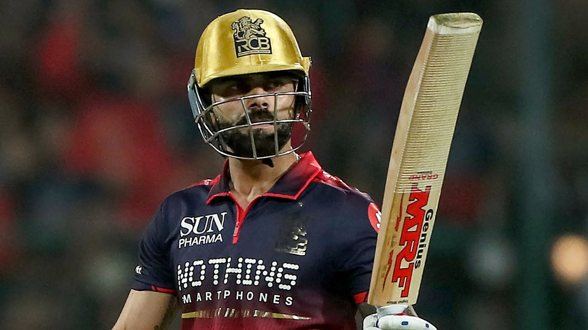 Royal Challengers Bengaluru's Indian cricket player Virat Kohli celebrates after scoring a half-century (50 runs) during the 2026 Indian Premier League (IPL) T20 match between Royal Challengers Bengaluru and Sunrisers Hyderabad at the M Chinnaswamy Stadium in Bengaluru on March 28, 2026. (Photo by AFP) / -- IMAGE RESTRICTED TO EDITORIAL USE - STRICTLY NO COMMERCIAL USE --