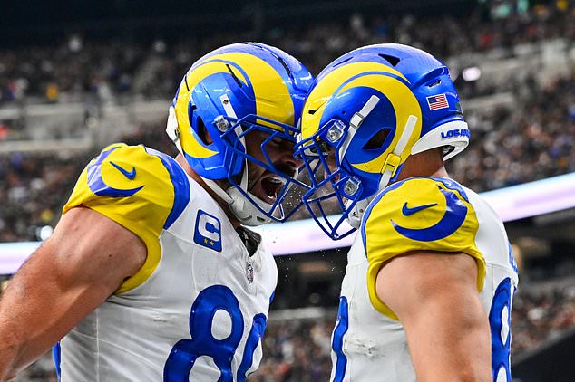 Los Angeles Rams tight end Davis Allen, right, celebrates his touchdown with teammate Tyler Higbee, left, during the first half of an NFL football game against the Las Vegas Raiders Sunday, Oct. 25, 2026, in Las Vegas. (AP Photo/David Becker)