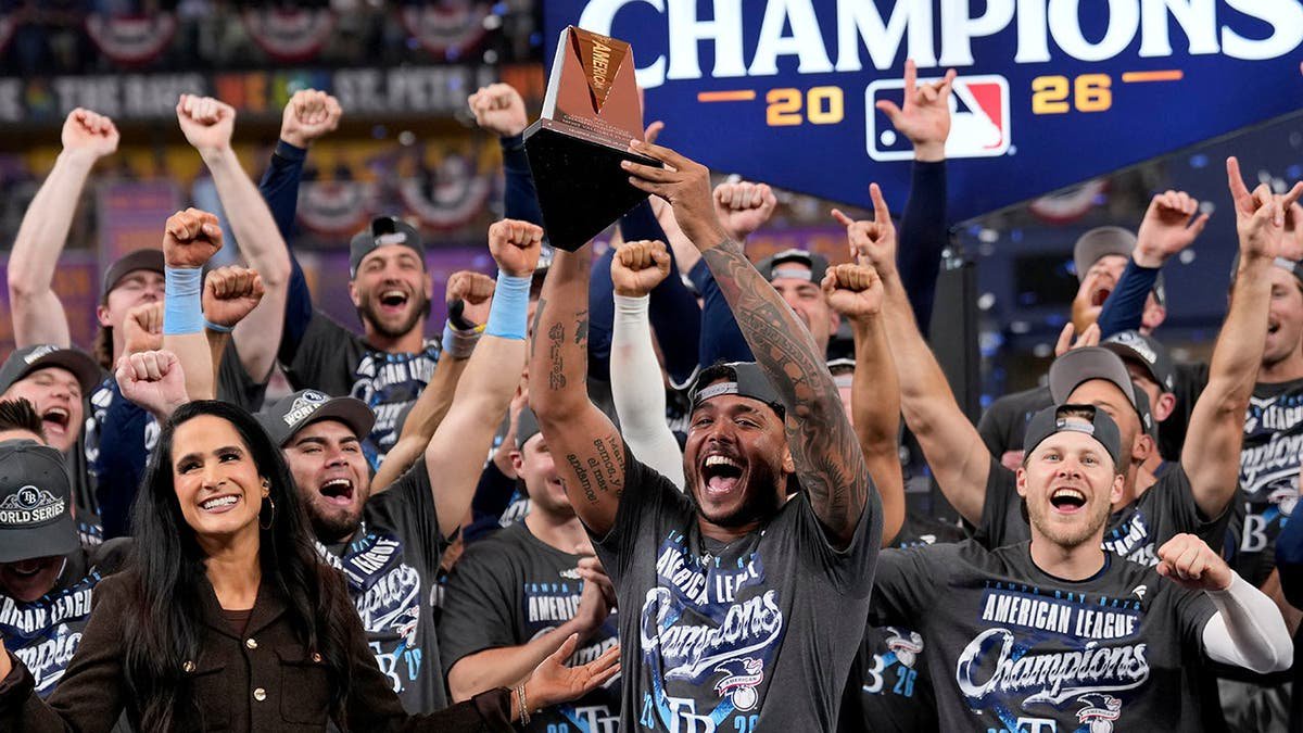 Freddy Peralta celebrates after the Rays' American League Championship Series win against the Guardians.