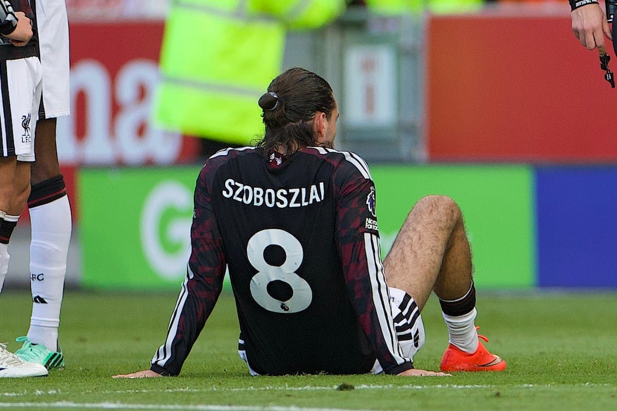 LONDON, ENGLAND - Saturday, October 17, 2026: Liverpool's Dominik Szoboszlai lies injured during the FA Premier League match between Brentford FC and Liverpool FC at the Brentford Community Stadium. (Photo by David Rawcliffe/Propaganda)