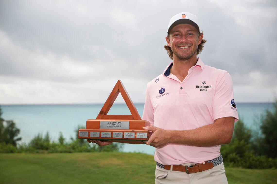 Austin Smotherman holds the trophy after winning the Butterfield Bermuda Championship on the PGA Tour