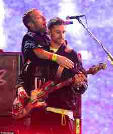 Similar complaints were made following Coldplay's headline set the following evening - pictured are frontman Chris Martin (left) and bassist Guy Berryman (right)