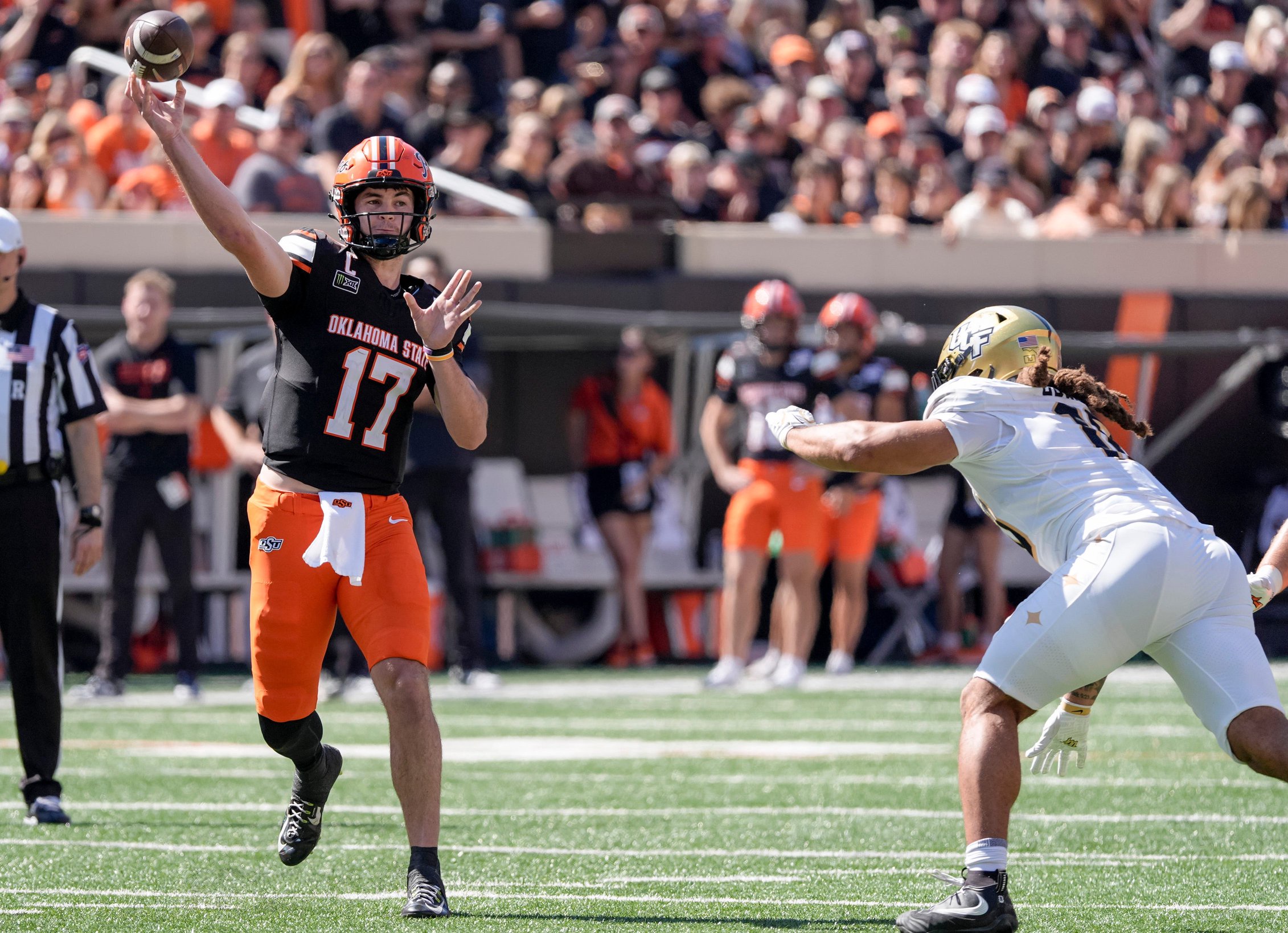 Oklahoma State Cowboys quarterback Drew Mestemaker (17) passes the ball in the third quarter against the UCF Knights at Boone Pickens Stadium in Stillwater, Oklahoma.