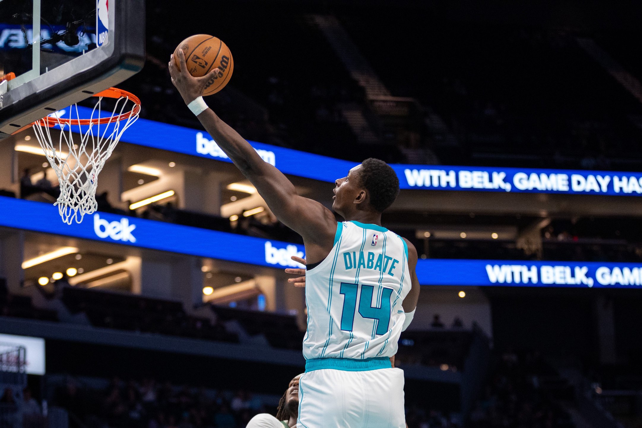 Oct 11, 2026; Charlotte, North Carolina, USA; Charlotte Hornets forward Moussa Diabate (14) shoots against the Milwaukee Bucks during the first quarter at Spectrum Center. Mandatory Credit: Scott Kinser-Imagn Images