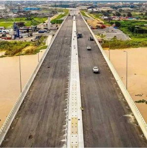  Applause As FG Begins Asphalt Laying, Street Lights Installation On The N386 Billion 2nd Niger Bridge
