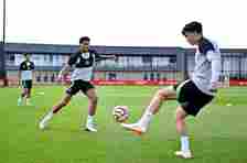 Jarell Quansah and Stefan Bajčetić of Liverpool during a training session at AXA Training Centre on September 14, 2023 in Kirkby, England.