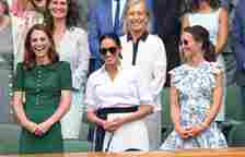 Kate Middleton with Meghan, Duchess of Sussex and Pippa Middleton in the Royal Box on Centre Court during day twelve of the Wimbledon Tennis Championships
