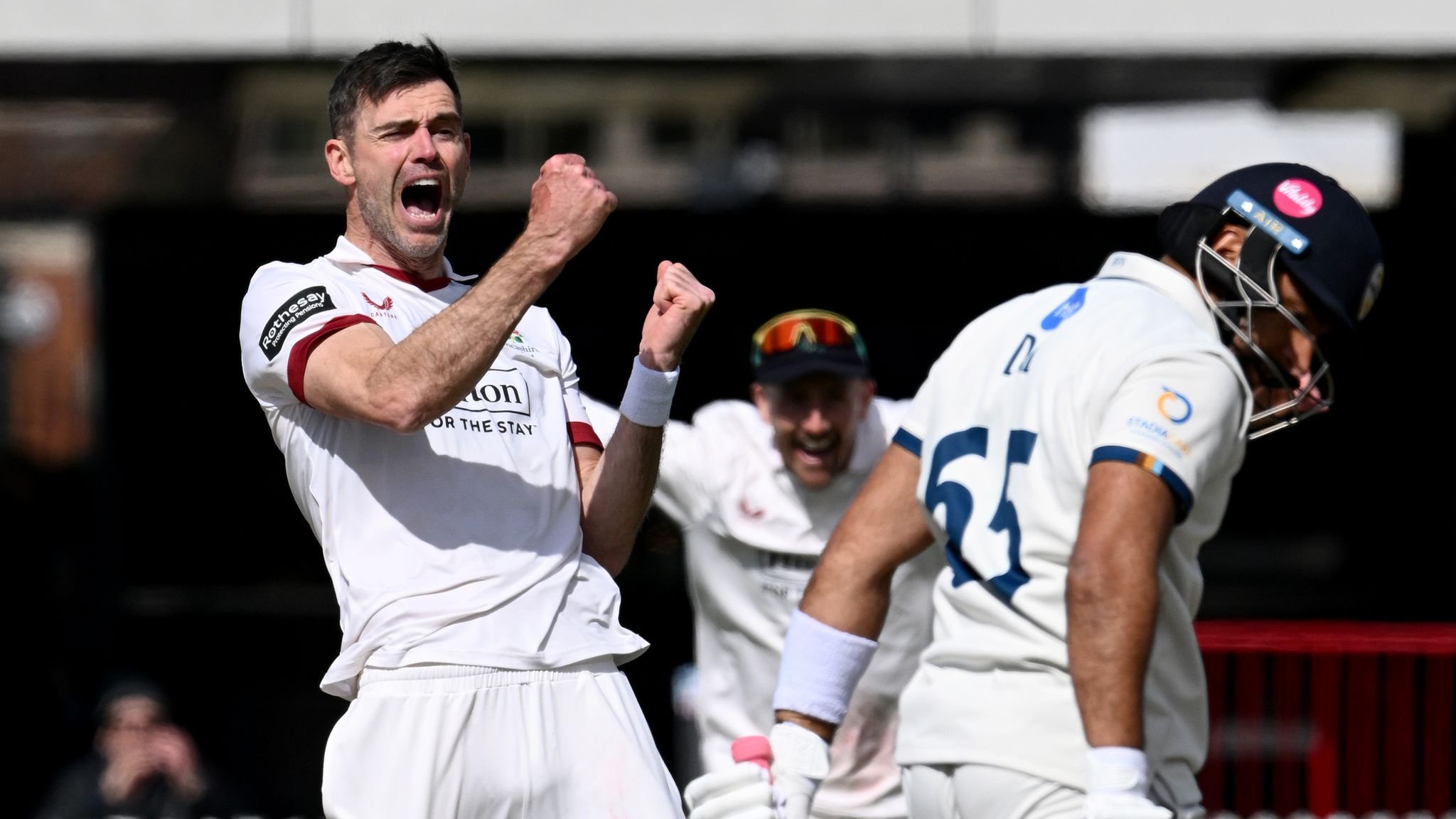 Lancashire captain James Anderson celebrates dismissing Derbyshire batter Anuj Dal