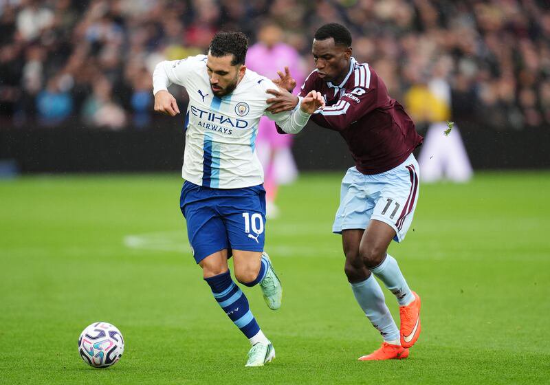 Rayan Cherki (left) was substituted due to his booking, according to Maresca
